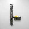A ProFlex Rack with the GearMate SteadyBin attached storing a sunglasses in a case and energy gels. 
